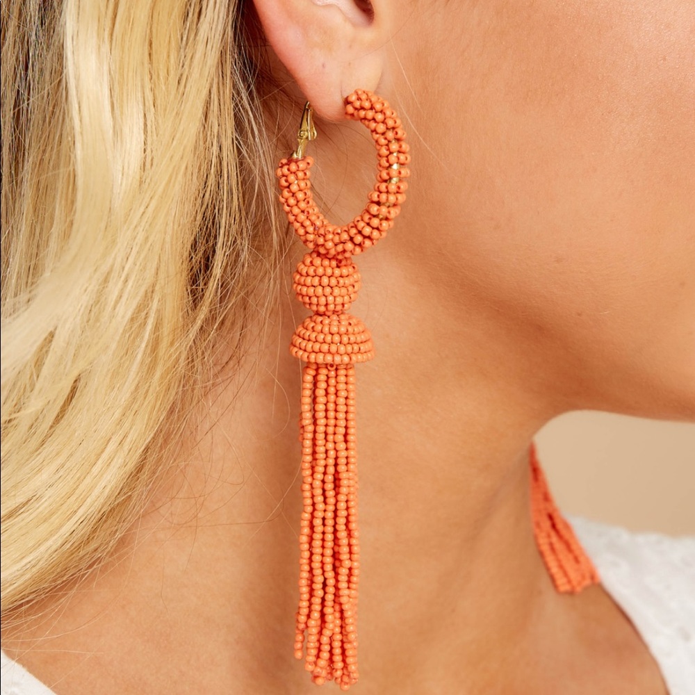 Coral beaded tassel earrings